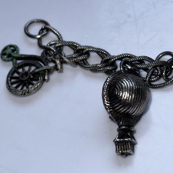 Vintage silver tone charm bracelet featuring modes of travel - Picture 6 of 8